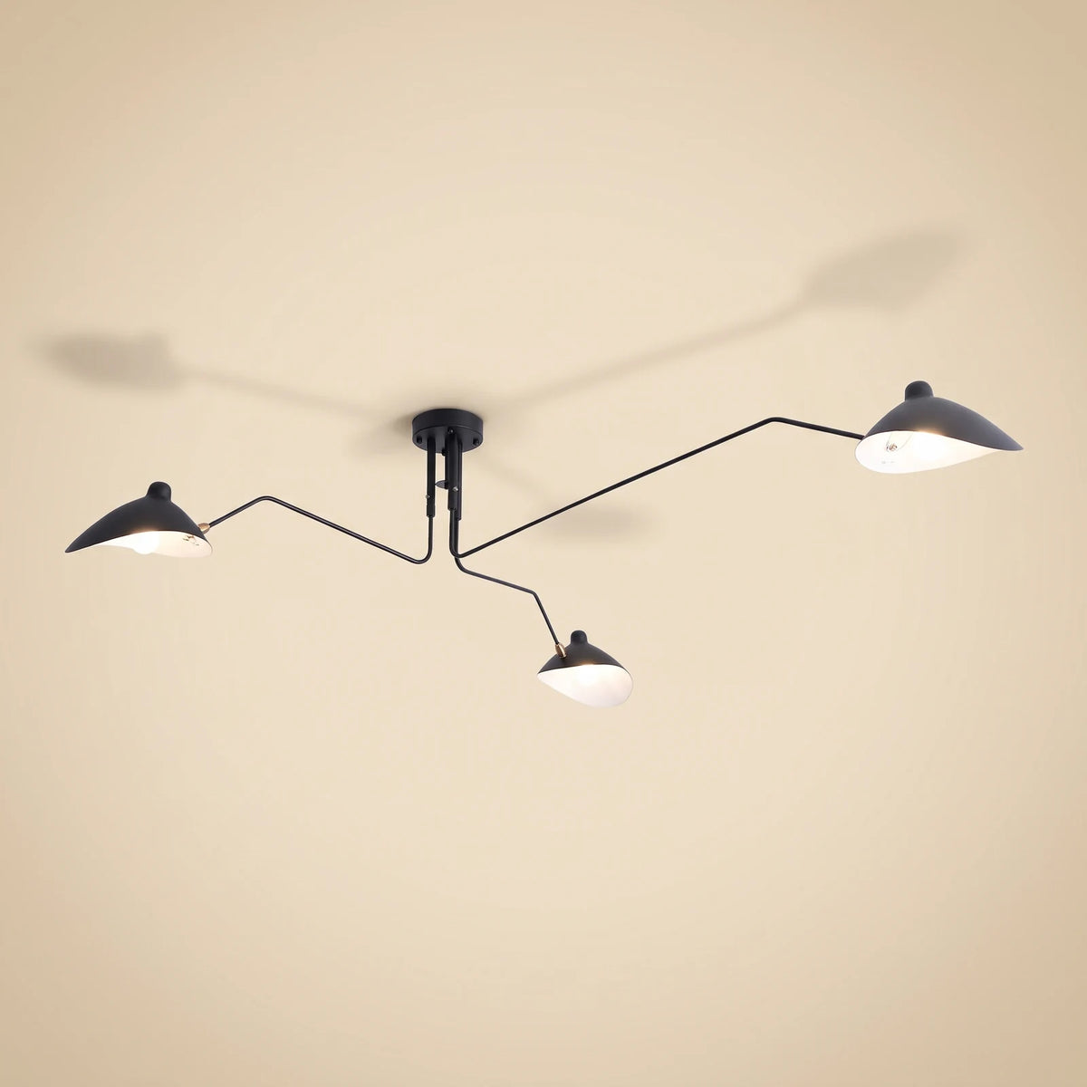 Three-arm ceiling light with angled reflector shades