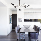 Three-arm ceiling light with angled reflector shades