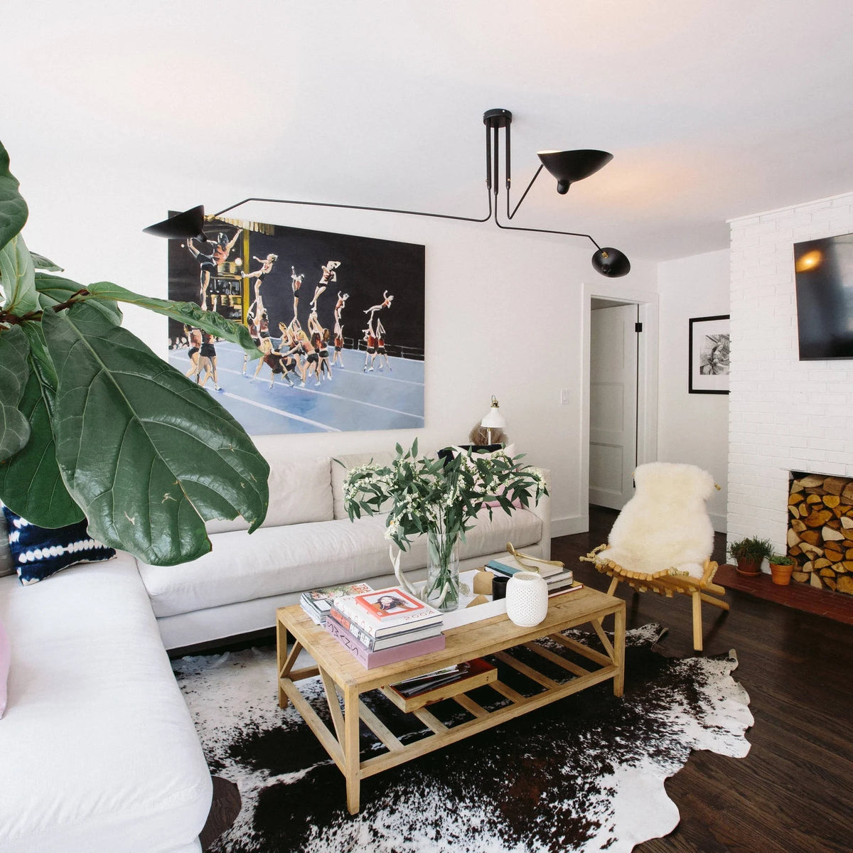 Three-arm ceiling light with angled reflector shades