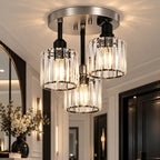 Three-light glass rod semi-flush ceiling light, lit, close-up