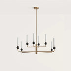 Opal glass and marble tiered chandelier, in aged gold with black marble