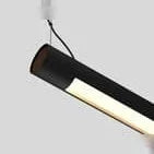 Tilting linear LED pendant, close-up, tilted and lit