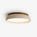 Travertine and wood flush ceiling light, on a white background