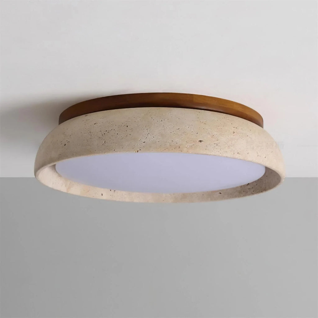 Travertine and wood flush ceiling light, lit on a ceiling