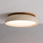 Travertine and wood flush ceiling light, lit on a ceiling