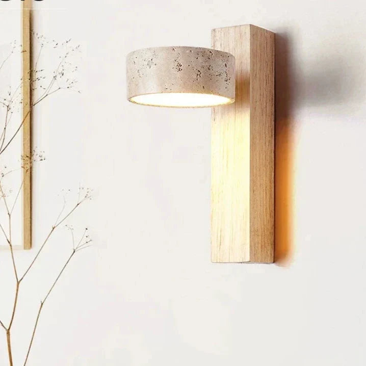 Travertine and wood wall light, close-up of the travertine head