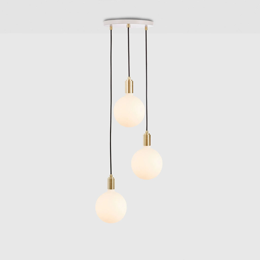 Triple opal sphere cluster pendant, with white canopy on a grey background