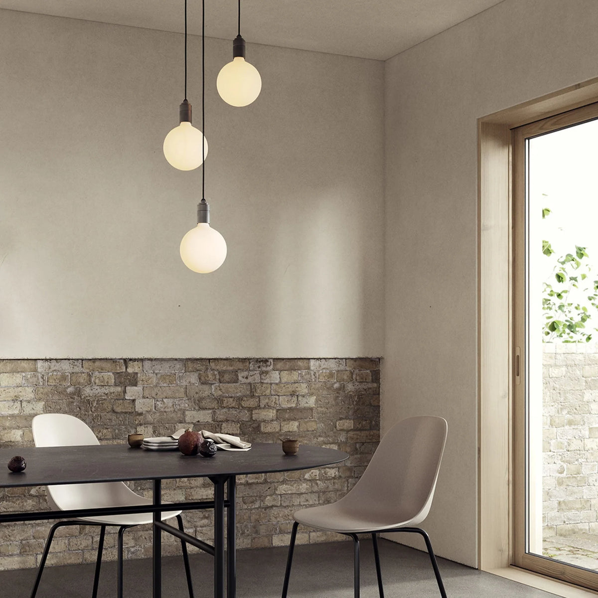 Triple Opal Sphere Cluster Pendant, above a dining table