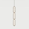 Triple ribbed capsule column LED pendant, with matte black details