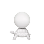 Turtle floor lamp with a glowing globe, in white