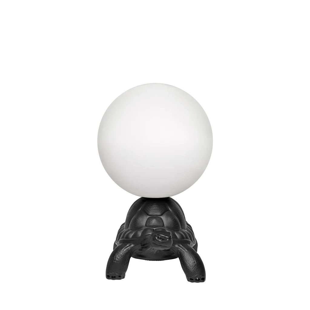 Turtle floor lamp with a glowing globe, in black