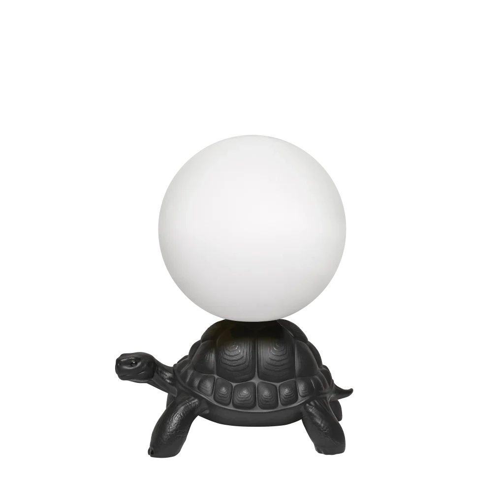 Turtle floor lamp with a glowing globe, in black