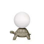 Turtle floor lamp with a glowing globe, in dove grey