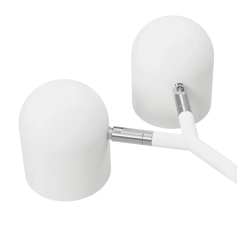 Twin-head adjustable floor lamp with a marble base, close-up of the two adjustable heads in white