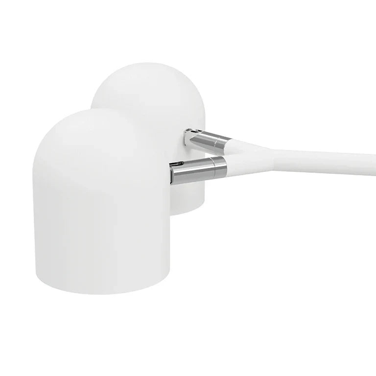 Twin-head adjustable table lamp, close-up of the two white heads