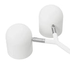 Twin-head adjustable table lamp, close-up of the white heads and joint