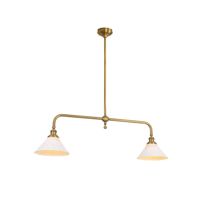 Two-light gold bar pendant with white cone shades, in a room