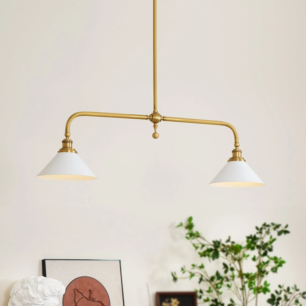 Two-light gold bar pendant with white cone shades, in a room