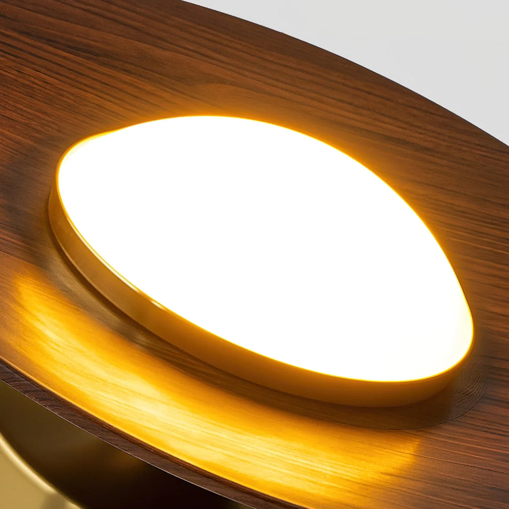 Low profile walnut and gold flush ceiling light, close-up of the wood disc and diffuser