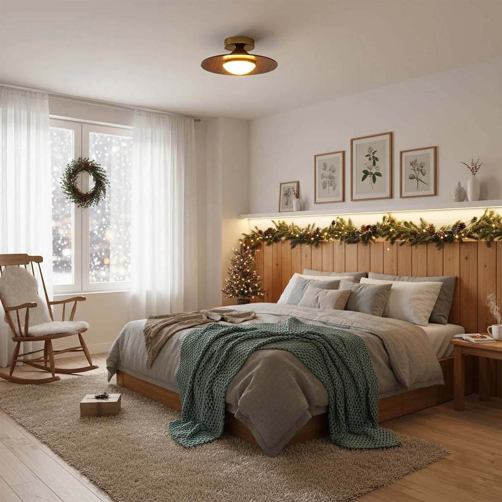 Low profile walnut and gold flush ceiling light, lit in a bedroom