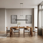 Walnut linear LED pendant, above a wooden dining table