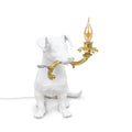 Dog table lamp in white resin with a gold-coloured candle arm, sitting upright