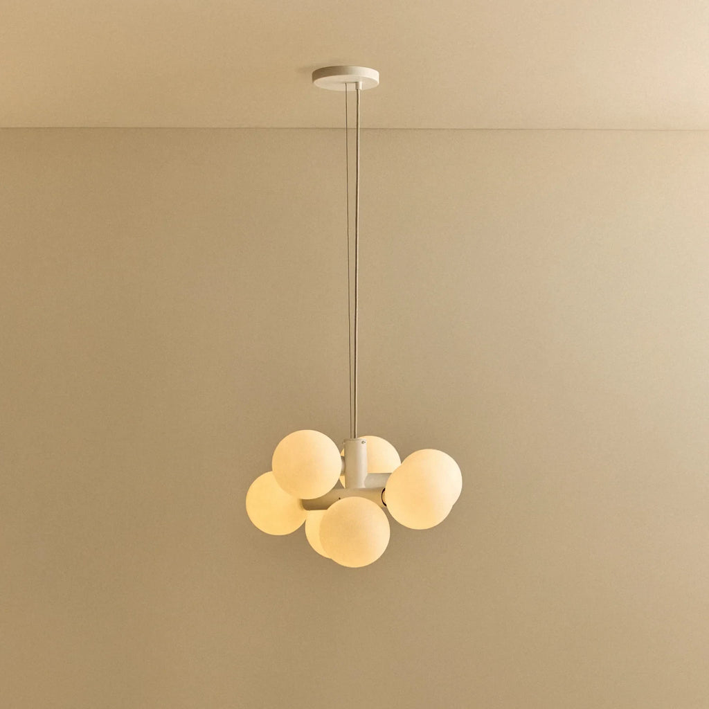 White steel globe cluster chandelier, lit