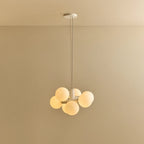 White steel globe cluster chandelier, lit