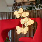 White steel globe cluster chandelier, several hung together