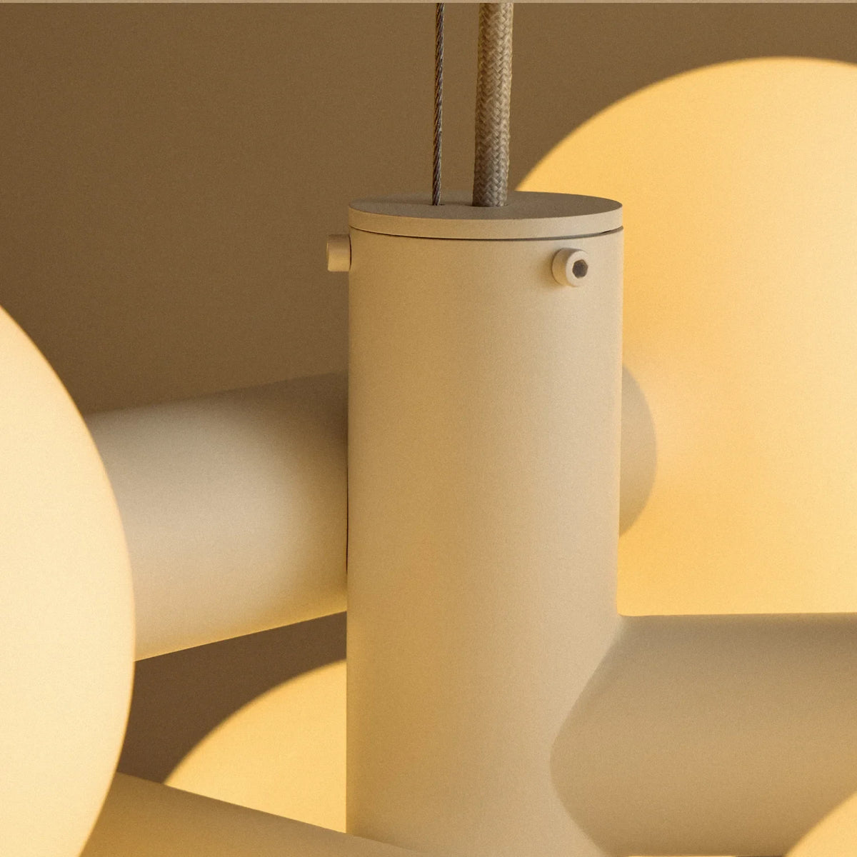 White steel globe cluster chandelier, detail of the steel cylinders and globes