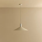 Large oyster white wide low-profile steel pendant, against a plain wall