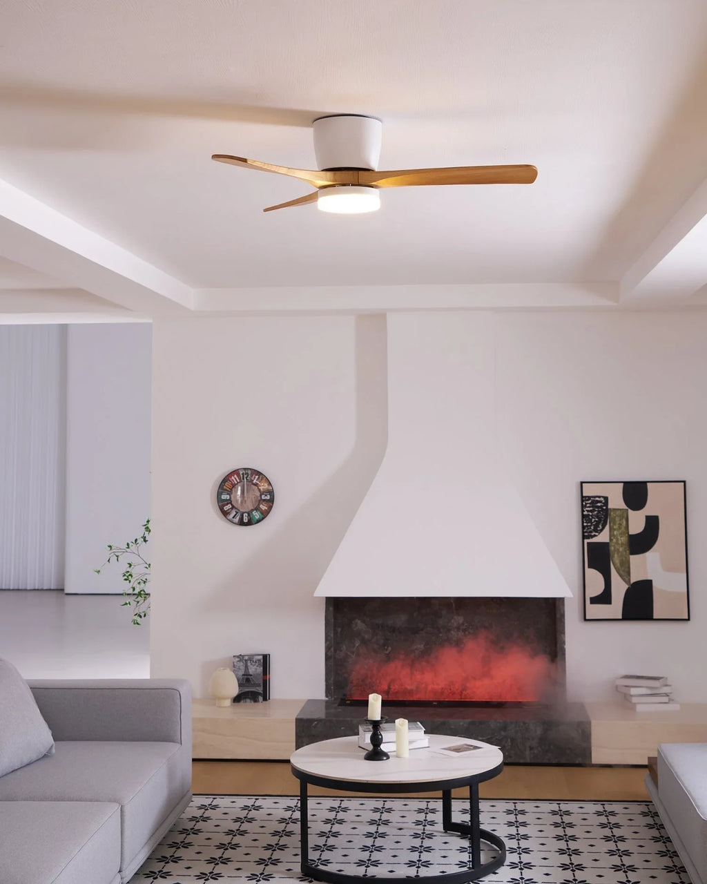 Wooden blade ceiling fan with LED light, in a living room with a fireplace