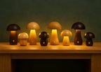 Wooden mushroom cordless table lamp, a group lit at night