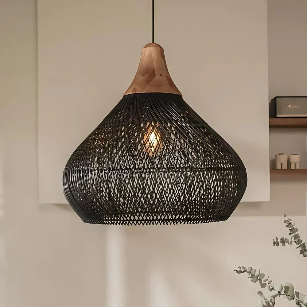 Woven rattan teardrop pendant light, in black, lit