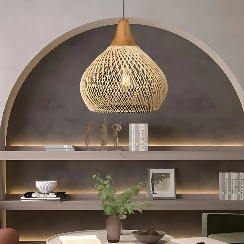 Woven rattan teardrop pendant light, in natural, in an alcove