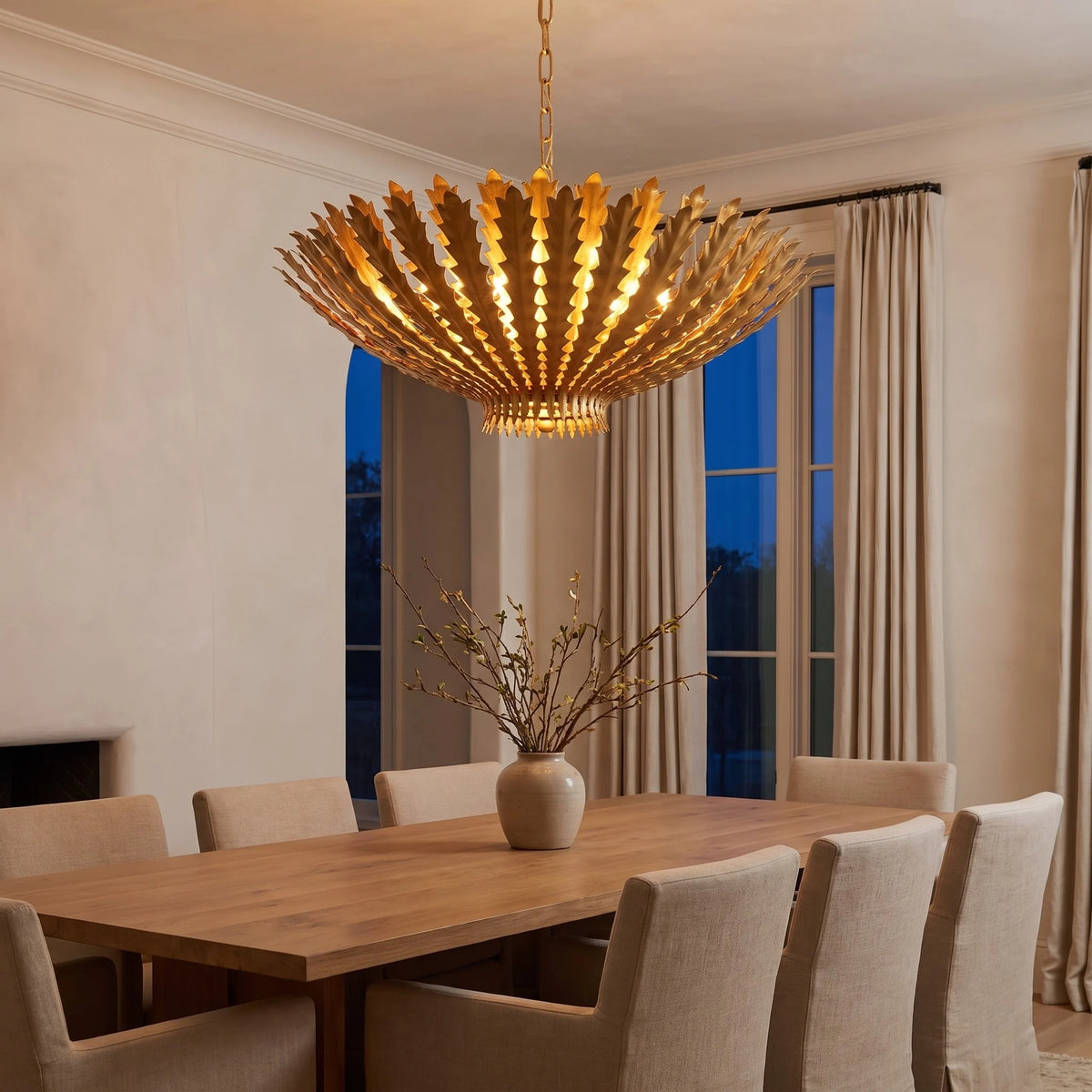Alabaster pendant lights above a dining table